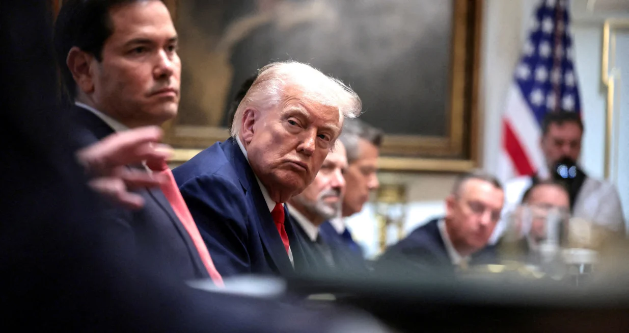 FILE PHOTO: U.S. President Donald Trump and Secretary of State Marco Rubio attend a cabinet meeting at the White House, in Washington, D.C., U.S., October 9, 2025. REUTERS/Evelyn Hockstein/File Photo/Evelyn Hockstein