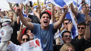 People react at "Hostages Square" on the day Hamas releases hostages, who have been held in Gaza since the deadly October 7, 2023 attack by Hamas, as part of a prisoner-hostage swap and a ceasefire deal between Israel and Hamas, in Tel Aviv, Israel, October 13, 2025. REUTERS/Shir Torem/Shir Torem