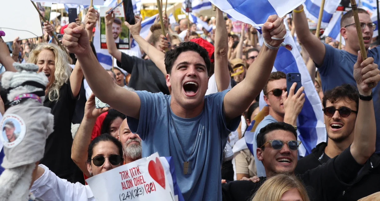 People react at "Hostages Square" on the day Hamas releases hostages, who have been held in Gaza since the deadly October 7, 2023 attack by Hamas, as part of a prisoner-hostage swap and a ceasefire deal between Israel and Hamas, in Tel Aviv, Israel, October 13, 2025. REUTERS/Shir Torem/Shir Torem