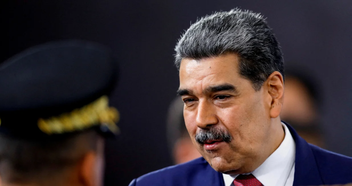 FILE PHOTO: Venezuela's President Nicolas Maduro prepares to leave at the end of a press conference, days after he said Venezuela would deploy military, police and civilian defenses at 284 "battlefront" locations across the country, amid heightened tensions with the U.S., in Caracas, Venezuela, September 15, 2025. REUTERS/Leonardo Fernandez Viloria/File Photo/Leonardo Fernandez Viloria