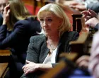 FILE PHOTO: French far-right leader and member of parliament Marine Le Pen, President of the French far-right National Rally (Rassemblement National - RN) party parliamentary group, is seen in the hemicycle before the first general policy speech by the French Prime Minister in front of the parliament and the new government following by a debate at the National Assembly in Paris, France, October 14, 2025. REUTERS/Gonzalo Fuentes/File Photo/Gonzalo Fuentes