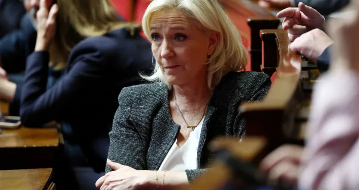 FILE PHOTO: French far-right leader and member of parliament Marine Le Pen, President of the French far-right National Rally (Rassemblement National - RN) party parliamentary group, is seen in the hemicycle before the first general policy speech by the French Prime Minister in front of the parliament and the new government following by a debate at the National Assembly in Paris, France, October 14, 2025. REUTERS/Gonzalo Fuentes/File Photo/Gonzalo Fuentes
