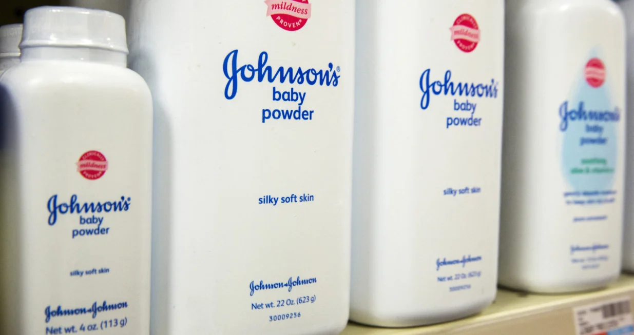 FILE PHOTO: Bottles of Johnson & Johnson baby powder line a drugstore shelf in New York October 15, 2015. REUTERS/Lucas Jackson/File Photo/Lucas Jackson