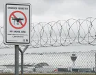 A sign with a drone ban is displayed outside the airport in Munich, Germany October 6, 2025. REUTERS/Angelika Warmuth/Angelika Warmuth