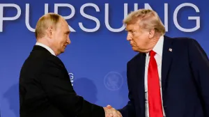 FILE PHOTO: U.S. President Donald Trump and Russian President Vladimir Putin shake hands during a press conference following their meeting to negotiate an end to the war in Ukraine, at Joint Base Elmendorf-Richardson, in Anchorage, Alaska, U.S., August 15, 2025. REUTERS/Kevin Lamarque/File Photo/Kevin Lamarque