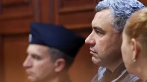 Ukrainian diver Volodymyr Zhuravlov, who is wanted by Germany over his alleged involvement in the 2022 explosions that damaged the Nord Stream pipeline and severely disrupted Russian gas supplies to Europe, listens to the judge's ruling to deny Germany's extradition request and lift his pretrial detention, at the district court in Warsaw, Poland, October 17, 2025. REUTERS/Kuba Stezycki/Kuba Stezycki