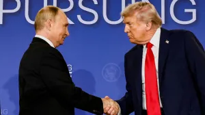 FILE PHOTO: U.S. President Donald Trump and Russian President Vladimir Putin shake hands during a press conference following their meeting to negotiate an end to the war in Ukraine, at Joint Base Elmendorf-Richardson, in Anchorage, Alaska, U.S., August 15, 2025. REUTERS/Kevin Lamarque/File Photo/Kevin Lamarque