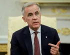 FILE PHOTO: Canada's Prime Minister Mark Carney speaks as he and U.S. President Donald Trump (not pictured) meet in the Oval Office at the White House in Washington, D.C., U.S., October 7, 2025. REUTERS/Evelyn Hockstein/File Photo/Evelyn Hockstein