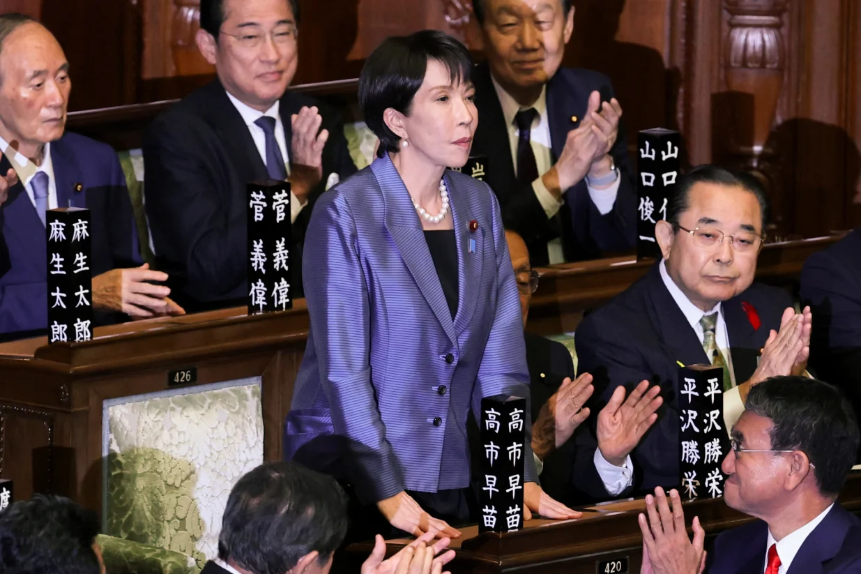 Leader of Japan's ruling Liberal Democratic Party (LDP) Sanae Takaichi reacts as she receives applause after being elected as prime minister, at the Lower House of Parliament in Tokyo, Japan October 21, 2025. REUTERS/Kim Kyung-Hoon/Kim Kyung-hoon