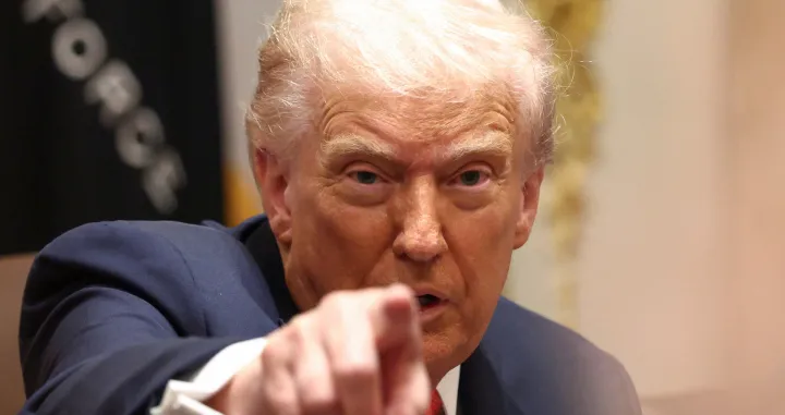 U.S. President Donald Trump gestures during a meeting with Australia's Prime Minister Anthony Albanese in the Cabinet Room at the White House, in Washington, D.C., U.S., October 20, 2025. REUTERS/Kevin Lamarque/Kevin Lamarque