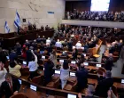 JERUSALEM - OCTOBER 13: U.S. President Donald Trump receives standing ovations as he addresses the Knesset, Israel's parliament, next to Amir Ohana, Speaker of the Israeli Knesset, and Israeli President Isaac Herzog on October 13, 2025 in Jerusalem.  Chip Somodevilla/Pool via REUTERS/Chip Somodevilla