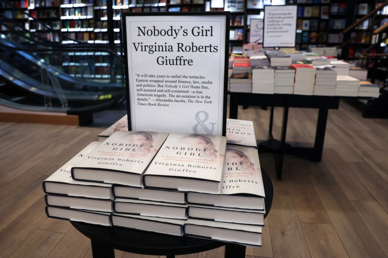 Copies of "Nobody's Girl: A Memoir of Surviving Abuse and Fighting for Justice," the posthumously published memoir by Virginia Giuffre, a prominent accuser of convicted sex offender Jeffrey Epstein, are displayed at a Barnes & Noble bookstore in New York City, U.S., October 21, 2025. REUTERS/Shannon Stapleton/Shannon Stapleton