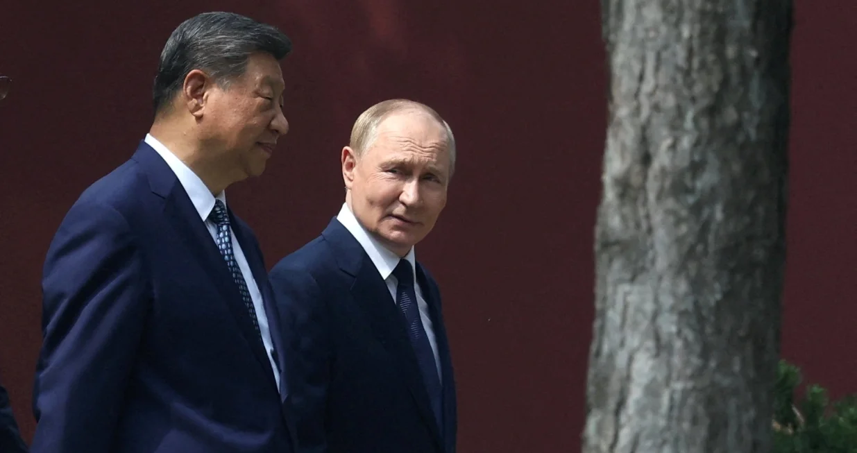 FILE PHOTO: Chinese President Xi Jinping and Russian President Vladimir Putin walk at the personal residence of the Chinese leader Zhongnanhai in Beijing, China September 2, 2025. Sputnik/Alexander Kazakov/Pool via REUTERS ATTENTION EDITORS - THIS IMAGE WAS PROVIDED BY A THIRD PARTY./File Photo/Alexander Kazakov