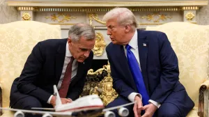 FILE PHOTO: U.S. President Donald Trump meets with Canada's Prime Minister Mark Carney in the Oval Office at the White House in Washington, D.C., U.S., October 7, 2025. REUTERS/Evelyn Hockstein/File Photo/Evelyn Hockstein