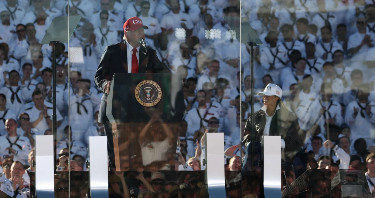 U.S. President Donald Trump delivers remarks from behind a bulletproof glass during a Navy 250 Celebration in Norfolk, Virginia, U.S. October 5, 2025. REUTERS/Jonathan Ernst/Jonathan Ernst