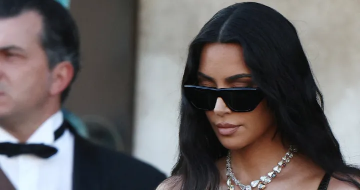 FILE PHOTO: Kim Kardashian leaves Gritti Palace, on the second day of the wedding festivities of Amazon founder Jeff Bezos and journalist Lauren Sanchez, in Venice, Italy, June 27, 2025. REUTERS/Guglielmo Mangiapane/File Photo/Guglielmo Mangiapane