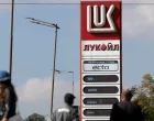 People walk near a Lukoil gas station in Sofia, Bulgaria, October 23, 2025. REUTERS/Stoyan Nenov/Stoyan Nenov