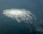 FILE PHOTO: Gas bubbles from the Nord Stream 2 leak reaching surface of the Baltic Sea in the area shows disturbance of well over one kilometre diameter near Bornholm, Denmark, September 27, 2022. Danish Defence Command/Handout via REUTERS/File Photo/Danish Defence Command