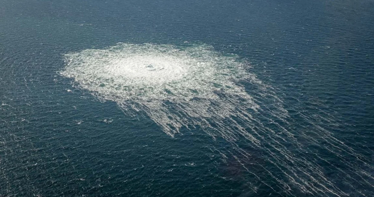 FILE PHOTO: Gas bubbles from the Nord Stream 2 leak reaching surface of the Baltic Sea in the area shows disturbance of well over one kilometre diameter near Bornholm, Denmark, September 27, 2022. Danish Defence Command/Handout via REUTERS/File Photo/Danish Defence Command