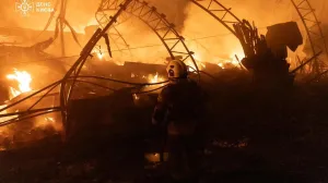 Firefighters work at the site of a Russian drone strike, amid Russia's attack on Ukraine, in Kyiv, Ukraine in this handout picture released October 23, 2025. Press service of the State Emergency Service of Ukraine in Kyiv/Handout via REUTERS ATTENTION EDITORS - THIS IMAGE HAS BEEN SUPPLIED BY A THIRD PARTY. MUST NOT OBSCURE LOGO./State Emergency Service Of Ukrai