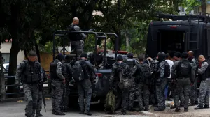 Members of the military police special unit gather to detain suspected drug dealers during a police operation against drug trafficking at the favela do Penha, in Rio de Janeiro, Brazil October 28, 2025. REUTERS/Aline Massuca/Aline Massuca