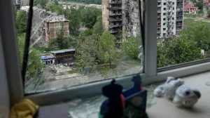 FILE PHOTO: A view shows apartment buildings hit by Russian military strikes in the front line town of Pokrovsk, amid Russia's attack on Ukraine, in Donetsk region, Ukraine May 21, 2025. REUTERS/Anatolii Stepanov/File Photo/Anatolii Stepanov