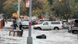 Vehicles move through floodwater in New York City, U.S. October 30, 2025, in this still image obtained from social media video. Mariah Whitmoyer/via REUTERS THIS IMAGE HAS BEEN SUPPLIED BY A THIRD PARTY. MANDATORY CREDIT. NO RESALES. NO ARCHIVES. VERIFICATION: - Location verified by road layout, street signage, buildings' facades and trees that matched file & satellite imagery. Coordinates included in original file metadata - Date verified by original file metadata/Mariah Whitmoyer
