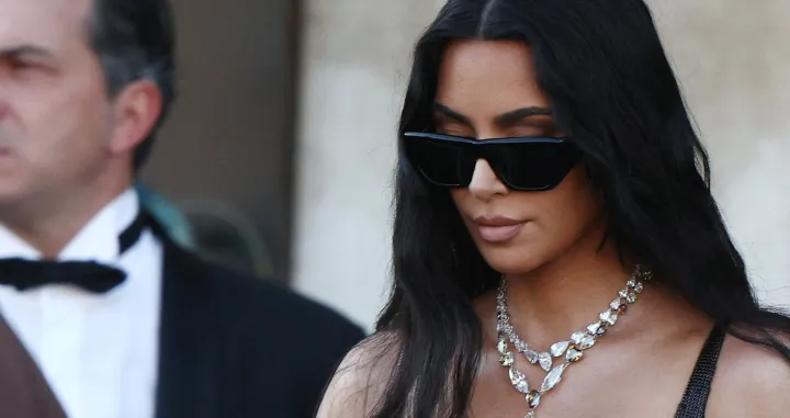 FILE PHOTO: Kim Kardashian leaves Gritti Palace, on the second day of the wedding festivities of Amazon founder Jeff Bezos and journalist Lauren Sanchez, in Venice, Italy, June 27, 2025. REUTERS/Guglielmo Mangiapane/File Photo/Guglielmo Mangiapane