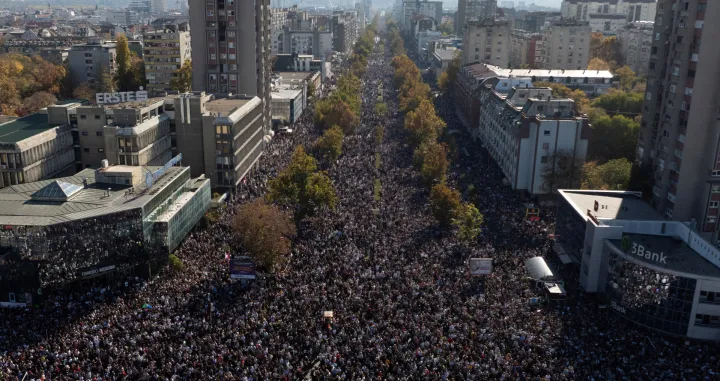 A drone view shows people gathering outside Novi Sad railway station during a commemorative service, on the first anniversary of the fatal November 2024 canopy collapse of the station, which killed 16 people, triggering nationwide accusations of widespread corruption and negligence, in Novi Sad, Serbia, November 1, 2025. REUTERS/Marko Djurica/Marko Djurica