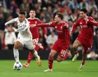 Soccer Football - UEFA Champions League - Liverpool v Real Madrid - Anfield, Liverpool, Britain - November 4, 2025 Real Madrid's Kylian Mbappe in action with Liverpool's Alexis Mac Allister REUTERS/Phil Noble/Foto: Phil Noble