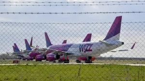 epa08313866 Nine passenger planes of the Hungarian low-cost airline WizzAir are parked at the Debrecen airport, Hungary, 22 March 2020, as the airline cut back on service due to the coronavirus COVID-19 pandemic. EPA/Zsolt Czegledi HUNGARY OUTHUNGARY OUT/Zsolt Czegledi