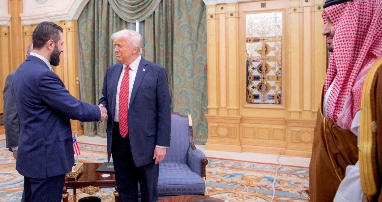 FILE PHOTO: U.S. President Donald Trump meets Syrian President Ahmed al-Sharaa in Riyadh, Saudi Arabia, in this handout released on May 14, 2025. Saudi Press Agency/Handout via REUTERS THIS IMAGE HAS BEEN SUPPLIED BY A THIRD PARTY/File Photo/Saudi Press Agency