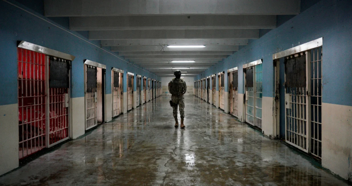 FILE PHOTO: A member of the military walks through a recently reconditioned area of the Penitenciaria del Litoral prison, in Guayaquil, Ecuador April 9, 2025. REUTERS/Santiago Arcos/File Photo/Santiago Arcos