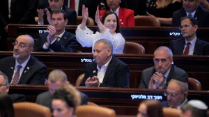 JERUSALEM - OCTOBER 13: Members of the Knesset applaud as U.S. President Donald Trump addresses the Knesset, Israel's parliament, on October 13, 2025 in Jerusalem. Chip Somodevilla/Pool via REUTERS/Chip Somodevilla