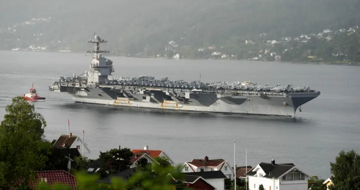 FILE PHOTO: U.S. Navy's USS Gerald R. Ford (CVN 78), the world's largest aircraft carrier, sails into the Oslofjord past Droebak and Oscarsborg fortress on its way for a port visit to Oslo, Norway, September 12, 2025. NTB/Lise Aaserud via REUTERS ATTENTION EDITORS - THIS IMAGE WAS PROVIDED BY A THIRD PARTY. NORWAY OUT. NO COMMERCIAL OR EDITORIAL SALES IN NORWAY./File Photo/Lise Aserud