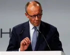 German Chancellor Friedrich Merz speaks during a groundbreaking ceremony for the IPAI CAMPUS, an artificial intelligence park, in Heilbronn, Germany, October 21, 2025. REUTERS/Heiko Becker REFILE - CHANGING FROM "EUROPE'S LARGEST ARTIFICIAL INTELLIGENCE PARK" TO "AN ARTIFICIAL INTELLIGENCE PARK"./Heiko Becker