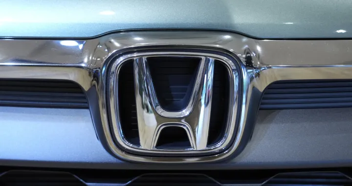 epa09943910 A Honda logo is seen on a vehicle displayed at a Honda showroom in Tokyo, Japan, 13 May 2022. Honda's consolidated sales revenue for the FY2021 ended 31 March 2022 increased by 10.5 percent from last year thanks to an increase in sales revenue in motorcycle business and financial services business operations. EPA/FRANCK ROBICHON/Franck Robichon