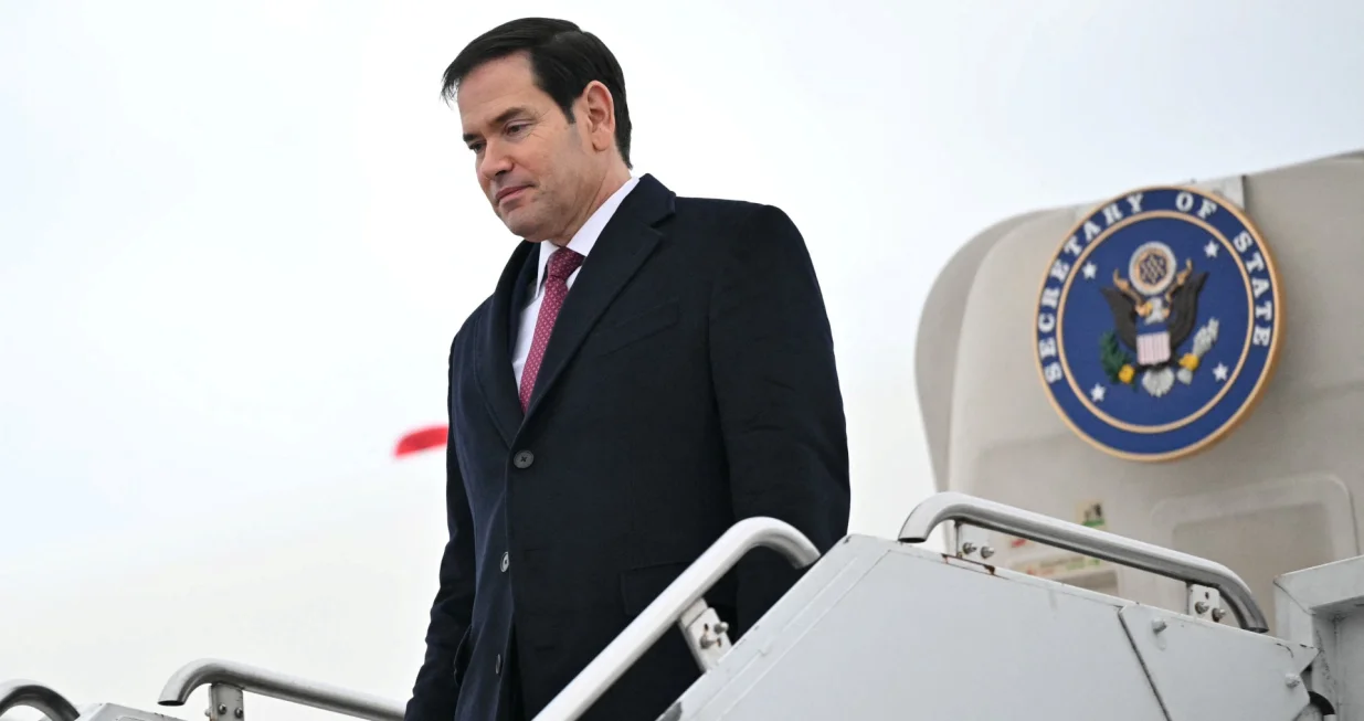 U.S. Secretary of State Marco Rubio steps off his plane upon arrival at the John C. Munro Hamilton International Airport in Hamilton, Ontario, November 11, 2025. Mandel Ngan/Pool via REUTERS/Mandel Ngan