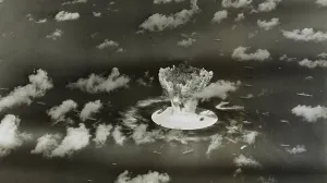FILE PHOTO: A mushroom cloud rises with ships below during Operation Crossroads nuclear weapons test on Bikini Atoll, Marshall Islands in this 1946 handout provided by the U.S. Library of Congress. The United States said on April 25, 2014, it was examining lawsuits filed by the Marshall Islands against it and eight other nuclear-armed countries that accuse them of failing in their obligation to negotiate nuclear disarmament. REUTERS/U.S. Library of Congress/Handout via Reuters (MARSHALL ISLANDS - Tags: POLITICS MILITARY CONFLICT) ATTENTION EDITORS - FOR EDITORIAL USE ONLY. NOT FOR SALE FOR MARKETING OR ADVERTISING CAMPAIGNS. THIS PICTURE WAS PROVIDED BY A THIRD PARTY. REUTERS IS UNABLE TO INDEPENDENTLY VERIFY THE AUTHENTICITY, CONTENT, LOCATION OR DATE OF THIS IMAGE. THIS PICTURE IS DISTRIBUTED EXACTLY AS RECEIVED BY REUTERS, AS A SERVICE TO CLIENTS/File Photo/Handout.