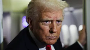 U.S. President Donald Trump looks on aboard Air Force One during travel to Palm Beach, Florida, from Joint Base Andrews, Maryland, U.S., November 25, 2025. REUTERS/Anna Rose Layden/Anna Rose Layden