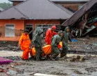 Rescuers carry a body bag of a victim recovered from an area hit by deadly flash floods following heavy rains in Malalak, Agam regency, West Sumatra province, Indonesia, November 28, 2025. REUTERS/Stringer/Stringer