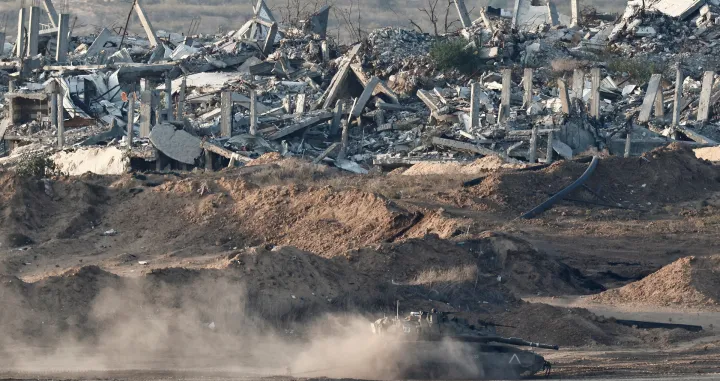 An Israeli tank operates in Gaza, as seen from Israel's border with Gaza, Israel, November 18, 2025. REUTERS/Amir Cohen/Amir Cohen