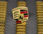 epa08271941 A view of a Logo at the production of Taycan electric sports cars at an assembly line at the German car manufacturer Porsche in Stuttgart, Germany, 05 March 2020. Porsche AG is a listed German manufacturer of luxury sports cars, SUVs and sedans based in Stuttgart. Porsche AG will present the results of the 2020 financial year at the annual press conference on 24 March 2020. EPA/RONALD WITTEK/Ronald Wittek