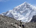 FILE PHOTO: Mountaineers and trekkers head towards the Everest base camp from Lobuche in the Solukhumbu district, also known as the Everest region, Nepal April 12, 2025. REUTERS/Purnima Shrestha/File Photo/Stringer