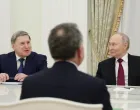 Russian President Vladimir Putin and foreign policy aide Yuri Ushakov attend a meeting with U.S. President Donald Trump's special envoy Steve Witkoff at the Kremlin in Moscow, Russia, December 2, 2025. Sputnik/Alexander Kazakov/Pool via REUTERS ATTENTION EDITORS - THIS IMAGE WAS PROVIDED BY A THIRD PARTY./Alexander Kazakov