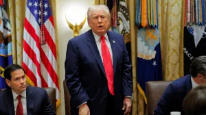 U.S. President Donald Trump, wearing band-aids on his hand, attends a cabinet meeting at the White House in Washington, D.C., U.S., December 2, 2025. REUTERS/Brian Snyder/Brian Snyder