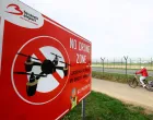 FILE PHOTO: A "No Drone Zone" placard at Brussels international Airport in Zaventem on the day of an emergency meeting of Belgian government officials and experts, following drone sightings that closed Brussels Airport, in Zaventem, Belgium, November 6, 2025. REUTERS/Yves Herman/File Photo/Yves Herman