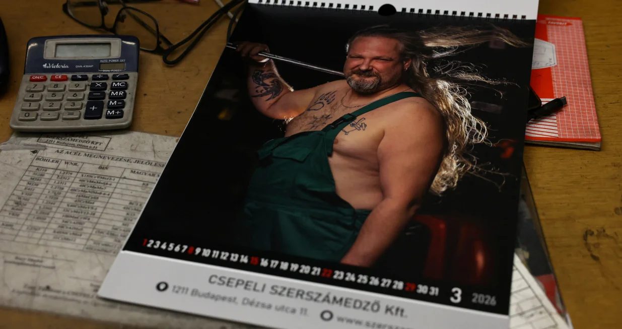 A calendar featuring Hungarian metalworkers posing half-naked sits at a steel workshop in Budapest, Hungary, December 5, 2025. REUTERS/Bernadett Szabo/Bernadett Szabo