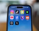 Instagram, TikTok, Snapchat, Kick, YouTube, Facebook, Twitch, Reddit, Threads and X applications are displayed on a mobile phone ahead of new law banning social media for users under 16 in Australia, in this picture illustration taken on December 9, 2025. REUTERS/Hollie Adams/Illustration/Hollie Adams