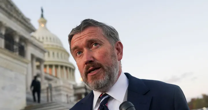 U.S. Representative Thomas Massie (R-KY) speaks with the media in front of the U.S. Capitol, as members of the U.S. House of Representatives returned to Washington after a 53-day break, for a vote that could bring the longest U.S. government shutdown in history to a close, in Washington, D.C., U.S., November 12, 2025. REUTERS/Nathan Howard/Nathan Howard